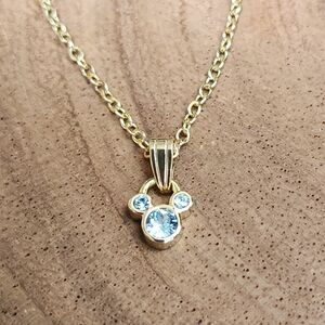 Gold Toned Mickey Mouse Necklace with Blue Crystal March Birthstone